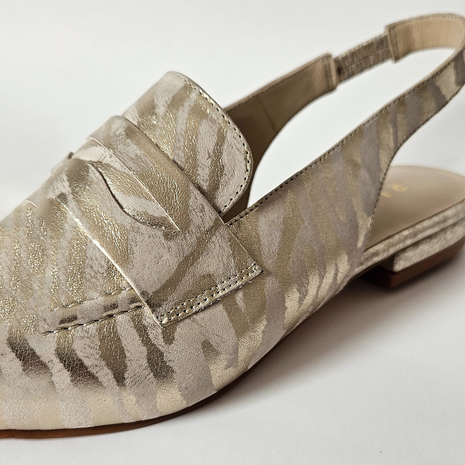 MOCASINES NAYA ANIMAL PRINT CEBRA DORADO